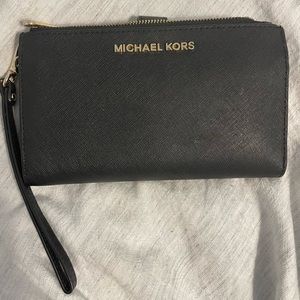 Michael Kors Gently used double zip wallet/wristlet.
